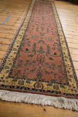 Traditional Indian Mohajeran Sarouk runner, its dark rose field adorned with sprawling floral vine motifs.