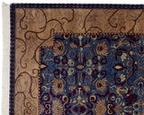 Full pile corner of the Arts and Crafts carpet, showing the beige vine border and blue floral field.