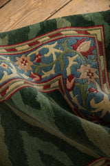 Lush, full pile and detailed scrolling vinery border of the Arts and Crafts runner rug.