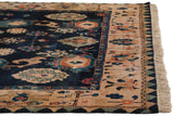 Hand knotted Indian Azeri rug corner with navy field, oversized floral patterns, ivory border and fringe.