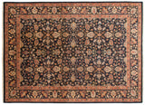 Vintage Indian Yezd carpet with allover scrolling florals on a navy ground and a warm terracotta border.