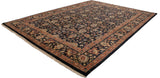 Vintage Indian Yezd carpet viewed from a corner angle, showing the full floral pattern and border.