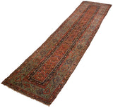 Angled perspective of an early Fereghan runner, showing its lattice design and signature green border.