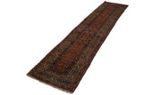 Angled view showing the full length and narrow form of this antique Fereghan runner.
