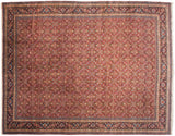 Corner of a vintage Tabriz carpet with a navy blue Samovar border against a red Herati motif field.