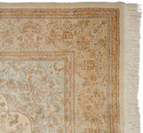 Vintage Tabriz carpet corner with an intact side selvage, full pile, and clean ivory fringe.