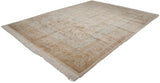Full angled view of a vintage Tabriz carpet with a plush ivory pile and powder blue details.