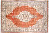 Vintage Tabriz carpet with a scalloped starburst medallion and ivory spandrels on a terra cotta open field.