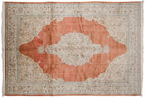 Intact side cord selvage and detailed corner spandrel of a hand-knotted vintage Tabriz carpet.