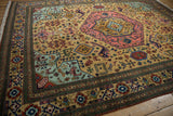Geometric relief of finned birds, animals, and plants on an ochre Ardebil carpet.