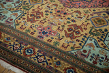 Geometric finned birds, animals, and plants in ochre, blush, mint on Vintage Ardebil carpet.