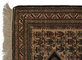 Intact ivory fringe and original side cord selvage on a hand-knotted vintage Ardebil rug.