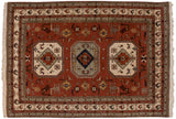 Vintage Meshkin carpet with a geometric triple medallion in rust, ivory, and navy blue, surrounded by animal motifs.