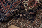 Like-new, full pile and hand-knotted texture of a folded vintage Ardebil rug.
