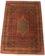 Vintage Indian Bijar carpet showcasing a diamond medallion and Herati motif in dusty brick red.
