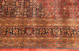 Detailed borders and Herati motif of vintage Indian Bijar carpet in red, navy, gold.