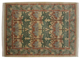 Vintage Indian William Morris design carpet with arts and crafts floral motifs in beige, green, raspberry.