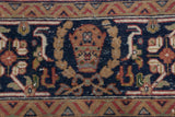 Plush pile of vintage Indian Bijar rug, showing navy blue, terracotta, and beige Herati patterns.