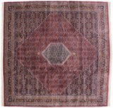 Hexagonal medallion featuring navy and slate blue surrounded by a dusty raspberry Herati pattern.