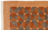 Hand-knotted Art Deco corner with beige fringe, plush copper and silver geometry.