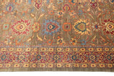 Vintage Agra carpet detail: splayed floral palmettes, lotus flowers, and a traditional border.