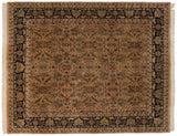 Vintage Indian Heriz design carpet with an allover floral pattern on a copper field and a dark navy blue border.