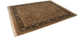 Angled view of the vintage Indian Heriz carpet's dense floral pattern and dark navy border.