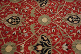 Close-up of the full, hand-knotted pile showing Arts and Crafts style vinery and floral motifs.