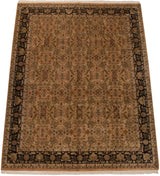Indian Heriz design carpet with a pale copper floral field, shown from an angled perspective.