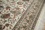 Plush high-grade wool pile and detailed floral border of an Indian Isfahan design carpet.