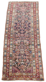 Antique Caucasian runner, dense Herati-like serrated leaf motifs, rare vibrant colors.