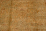 Lustrous plush wool pile of an Indian Oushak rug with tone-on-tone gold and seafoam floral motifs.