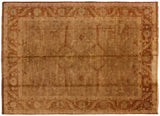 Indian Oushak carpet in gold wash and rust tones with an allover turtle arabesque design.