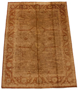 Angled view of an Indian Oushak carpet showcasing its soft, high luster pile.