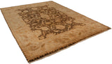 Angled perspective of a gold wash Indian Oushak carpet with a lustrous, floral pile.