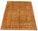 Oushak carpet showcasing Samovar turtle arabesques, sage gold field, and rust vine border.