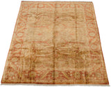 Gold wash Indian Oushak carpet with Samovar turtle design and varied sheen across pile.