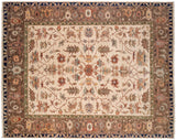 Hand-knotted Indian Serapi design carpet with ivory field, medallion, elaborate vinery, brown borders.