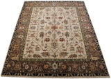 Ornate dark brown Serapi border with copper, green, ivory vinery, navy guard.