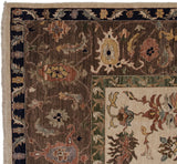 Corner detail of Indian Serapi rug with brown field, navy border, and sprawling vinery.