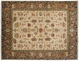 Elaborate Serapi design with sprawling vinery, oversized buds, and layered leaves on ivory.