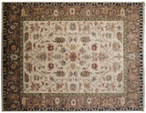 Elaborate sprawling vinery, oversize buds, and layered leaves on a traditional Serapi rug.