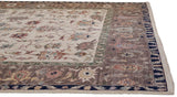 Intact side cord selvage and navy blue outer border with curvilinear motifs.