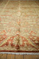 Low-angle view of the Indian Oushak carpet's soft, lustrous pile and golden-green field.