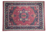 Vintage stone wash Dhurrie carpet with a geometric center medallion in raspberry, navy blue, and powder blue.