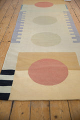 Abstract contemporary Kilim runner end design in black, ivory, madder red, and saffron gold.