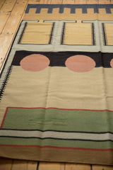 Geometric details of the contemporary kilim rug, featuring green block and layered stripes.