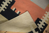Hand woven beige reverse of contemporary Kilim rug and geometric pattern details.