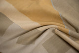 Vintage contemporary kilim detail showing flat weave, argyle diamond patterns in beige, gold, and gray.