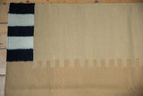 Hand woven Contemporary Kilim corner, bold black, ivory stripes, subtle tone-on-tone beige.